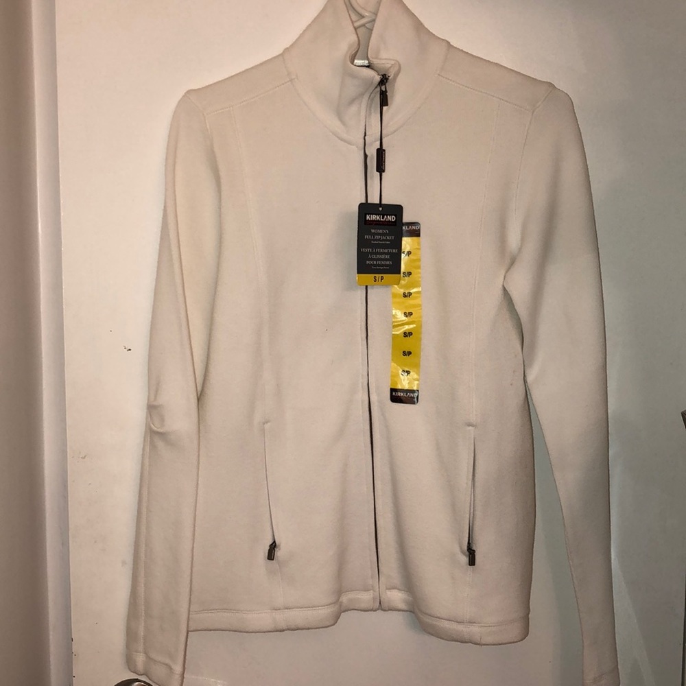 Unworn white Kirkland jacket